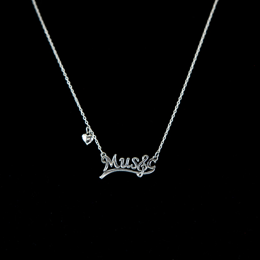Sterling Silver Chain & Pendant. Pendant has the word Music with a treble clef & heart attached. Chain 40cm with a 5cm extender.