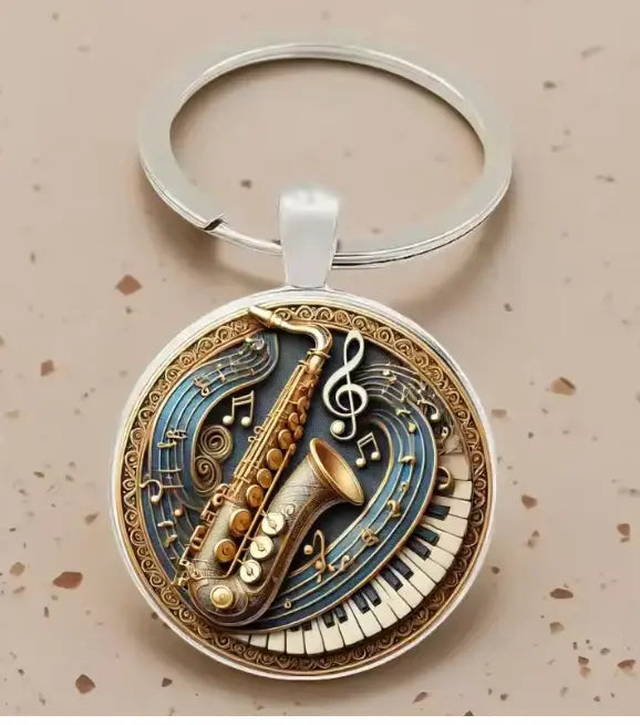 Glass Dome Keyring with a Saxophone and Keyboard