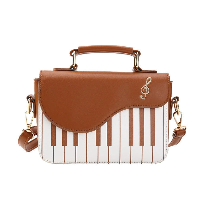 Ochre Handbag with White Keyboard and White Embroided Treble Clef