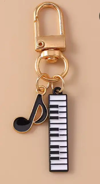 Gold Charmlet with a Keyboard & Quaver Note