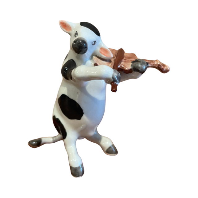 Porcelain Cow with Pink Ears Playing the Violin.