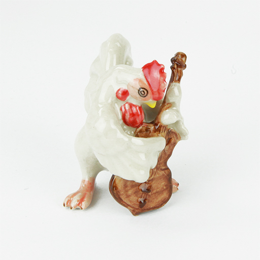 Porcelain Figurine of a Hen Playing the Bass.