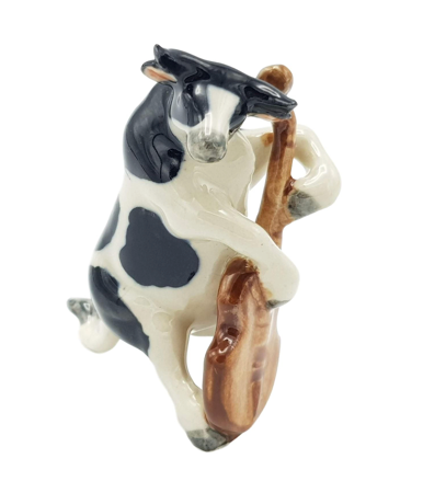 Porcelain Bull Playing the Double Bass