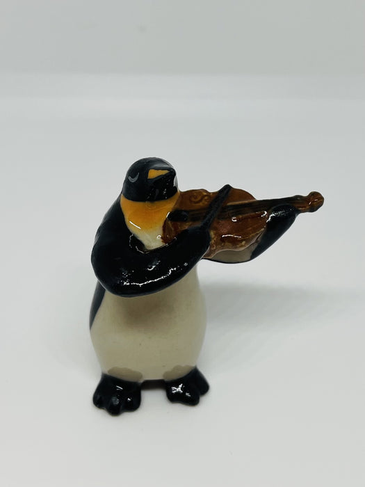 Porcelain Penguin Playing the Violin.