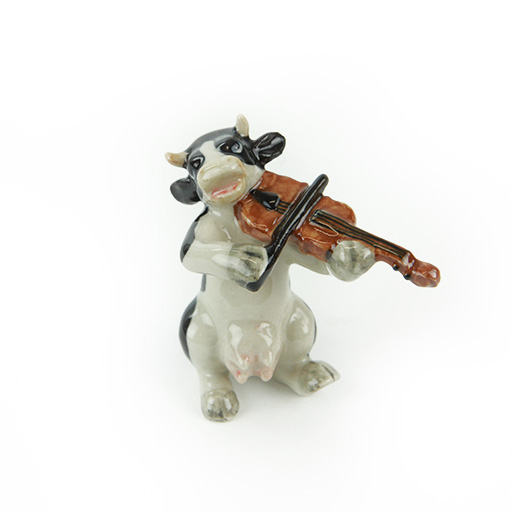 Porcelain Cow Playing the Violin.