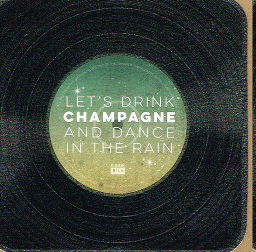 ***WAS $5.95***Greeting Card - a vinyl with the words “Let’s Drink Champagne & Dance in the Rain”. Vinyl Black.