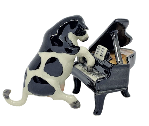 Porcelin Figurine - Cow playing the Piano.