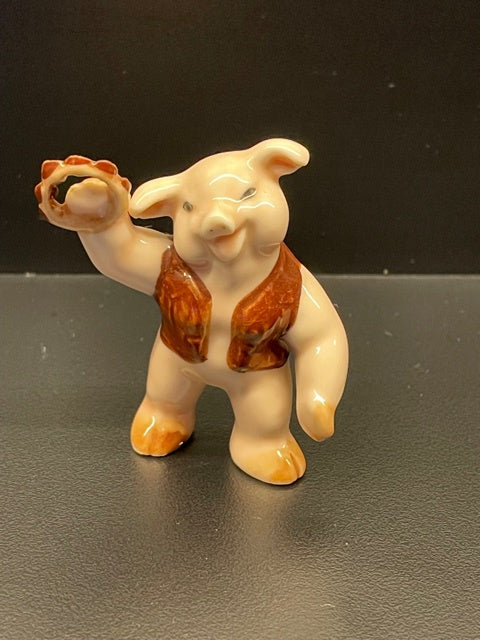 Porcelain Pig Playing the Tambourine